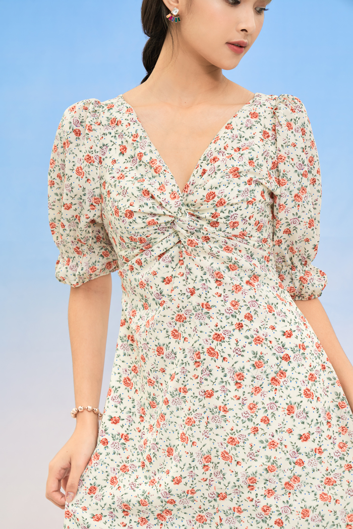 Đầm midi xoắn ngực nhấn tay