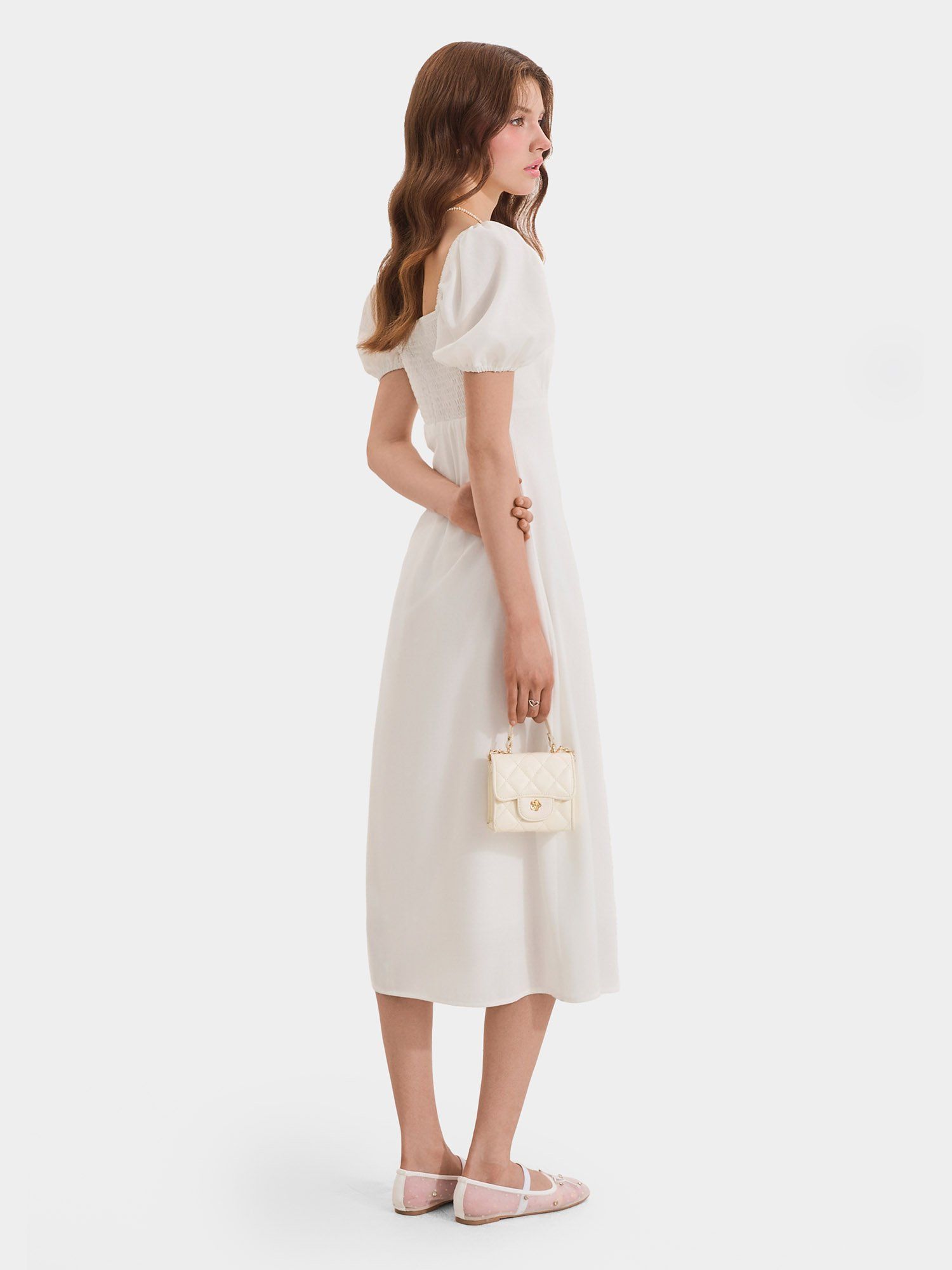  Đầm midi linen cổ vuông tay phồng smocking lưng 