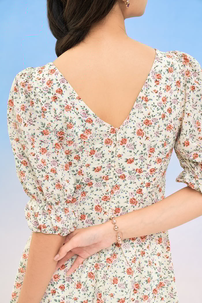 Đầm midi xoắn ngực nhấn tay