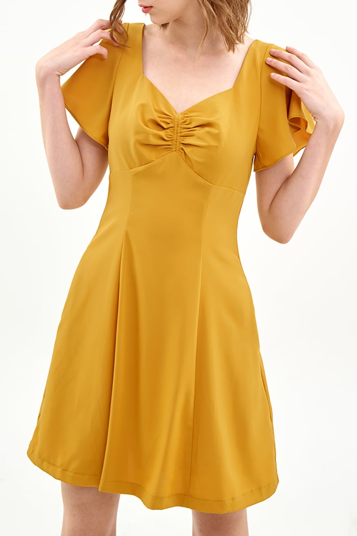 Đầm rút nhún ngực tay con rã cúp