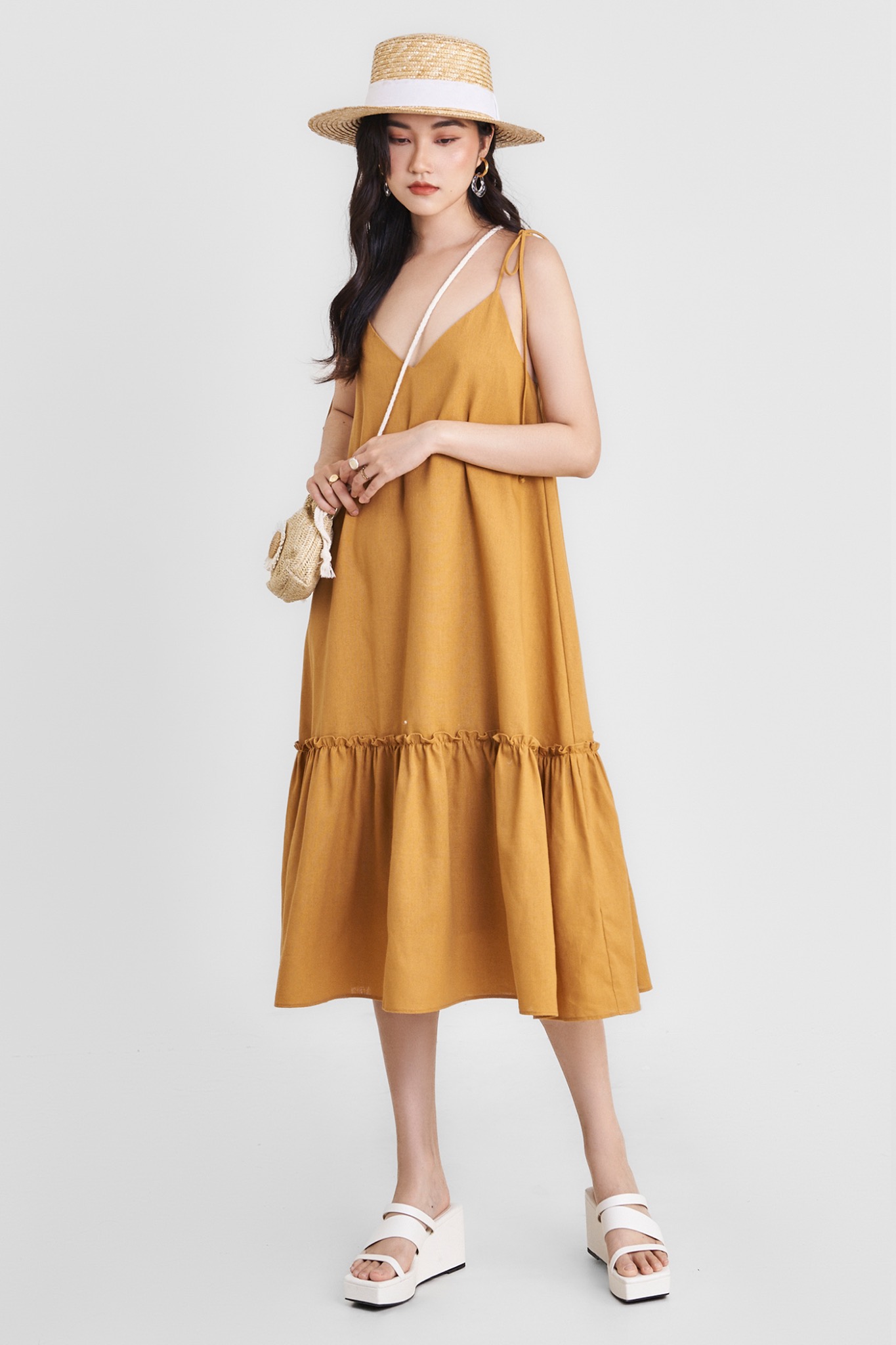 Đầm 2 dây midi linen hạ eo