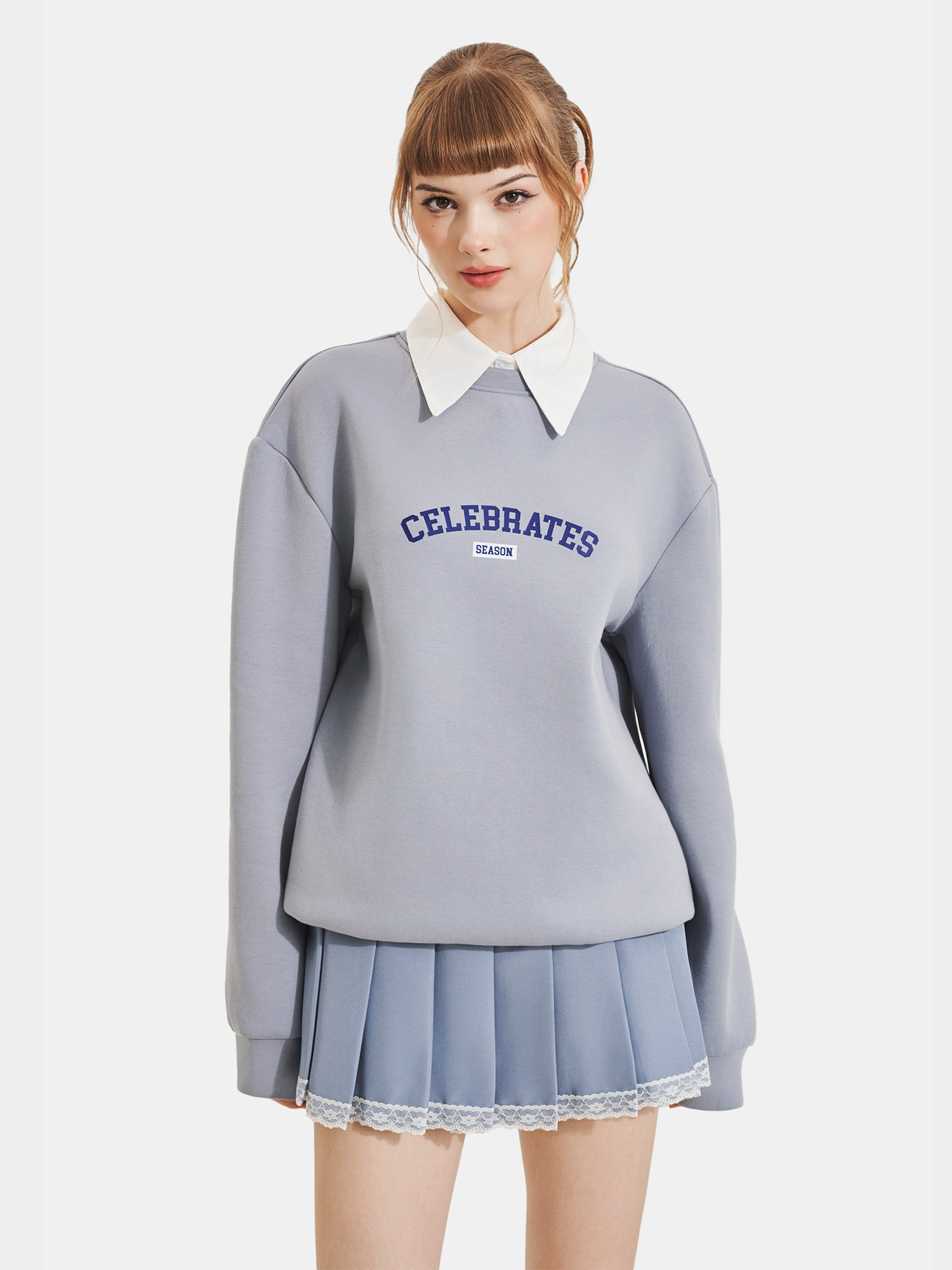 Áo sweater phối cổ sơ mi in chữ