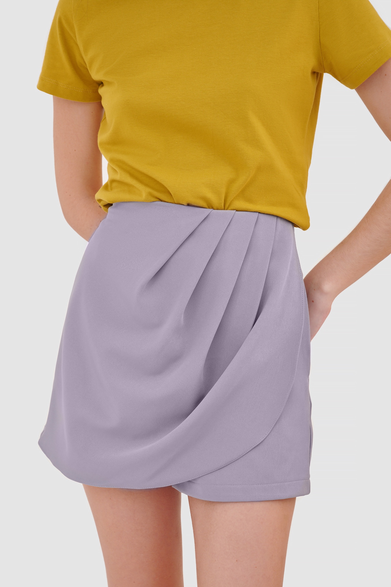 Váy skort xếp tà