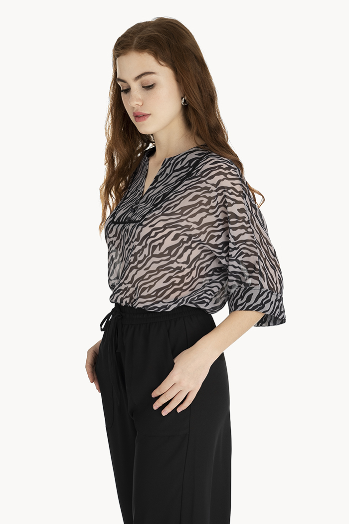 Áo hoạ tiết zebra rã đô viền