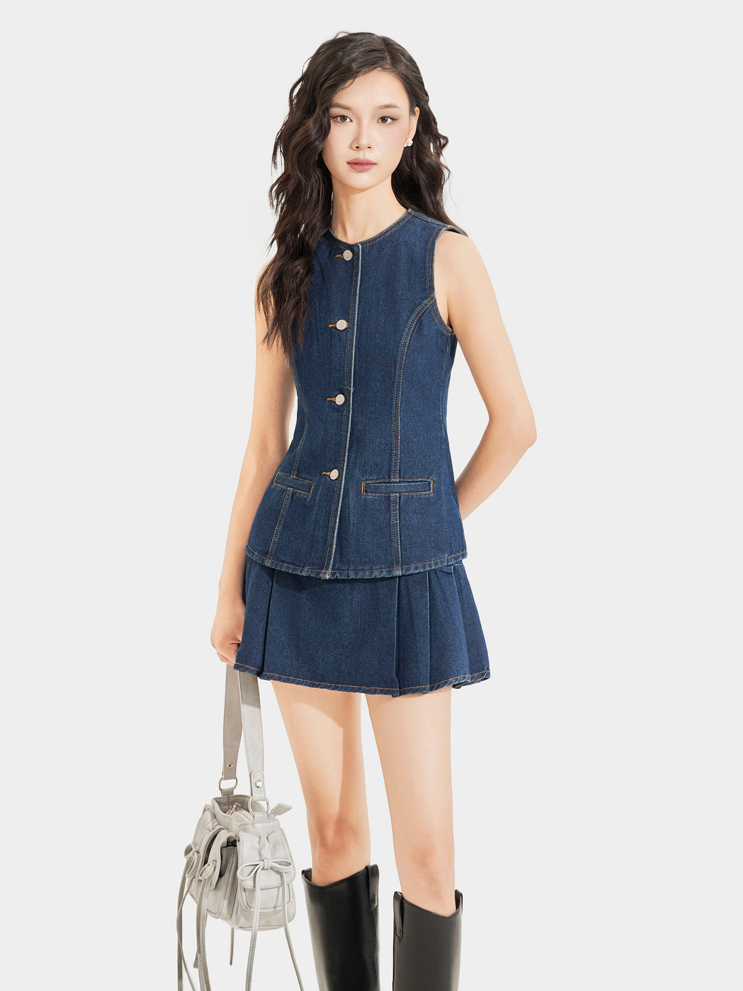 Váy jean mini xếp li diễu chỉ nổi