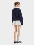  Áo sweater phối cổ sơ mi in chữ 