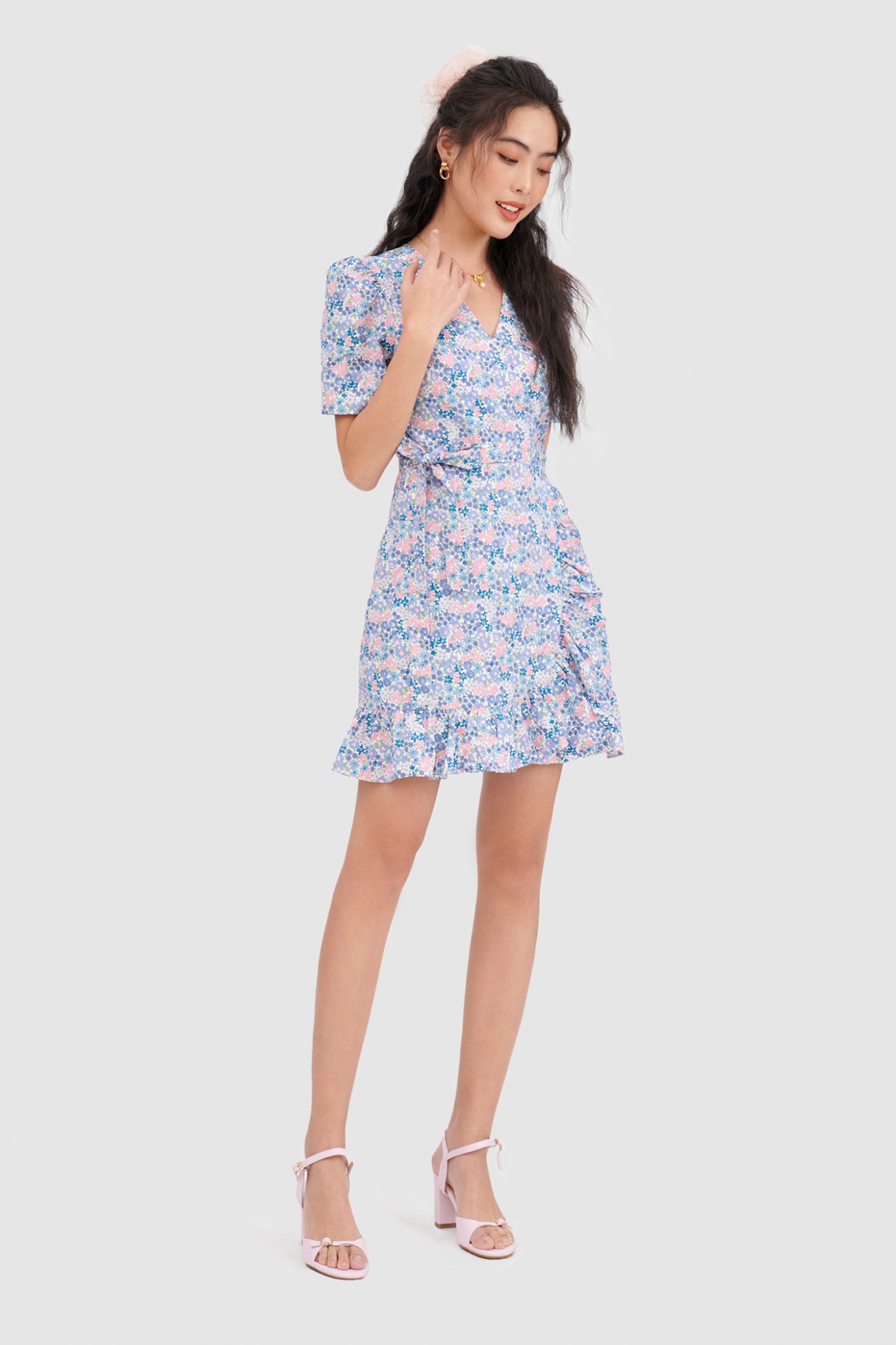 Đầm đắp chéo mini cột nơ hoạ tiết hoa