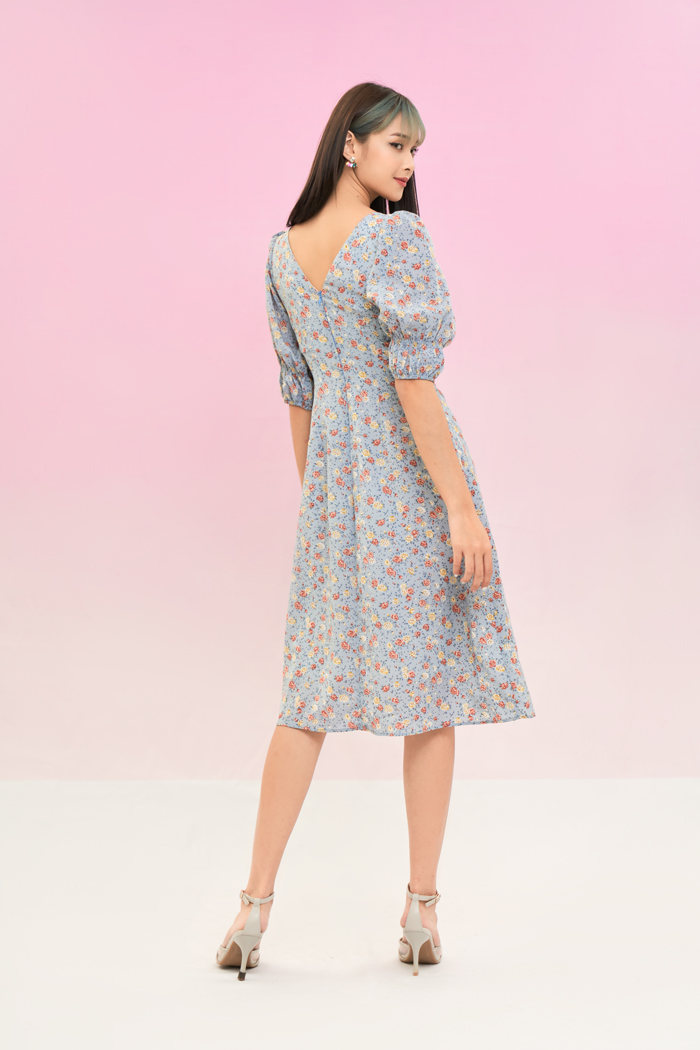Đầm midi xoắn ngực nhấn tay