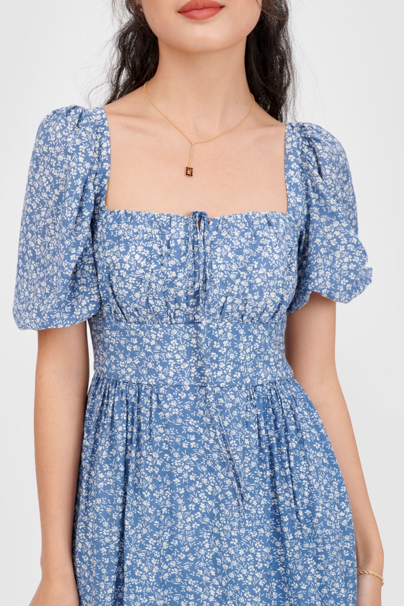 Đầm tay phồng smocking lưng hoa nhí 