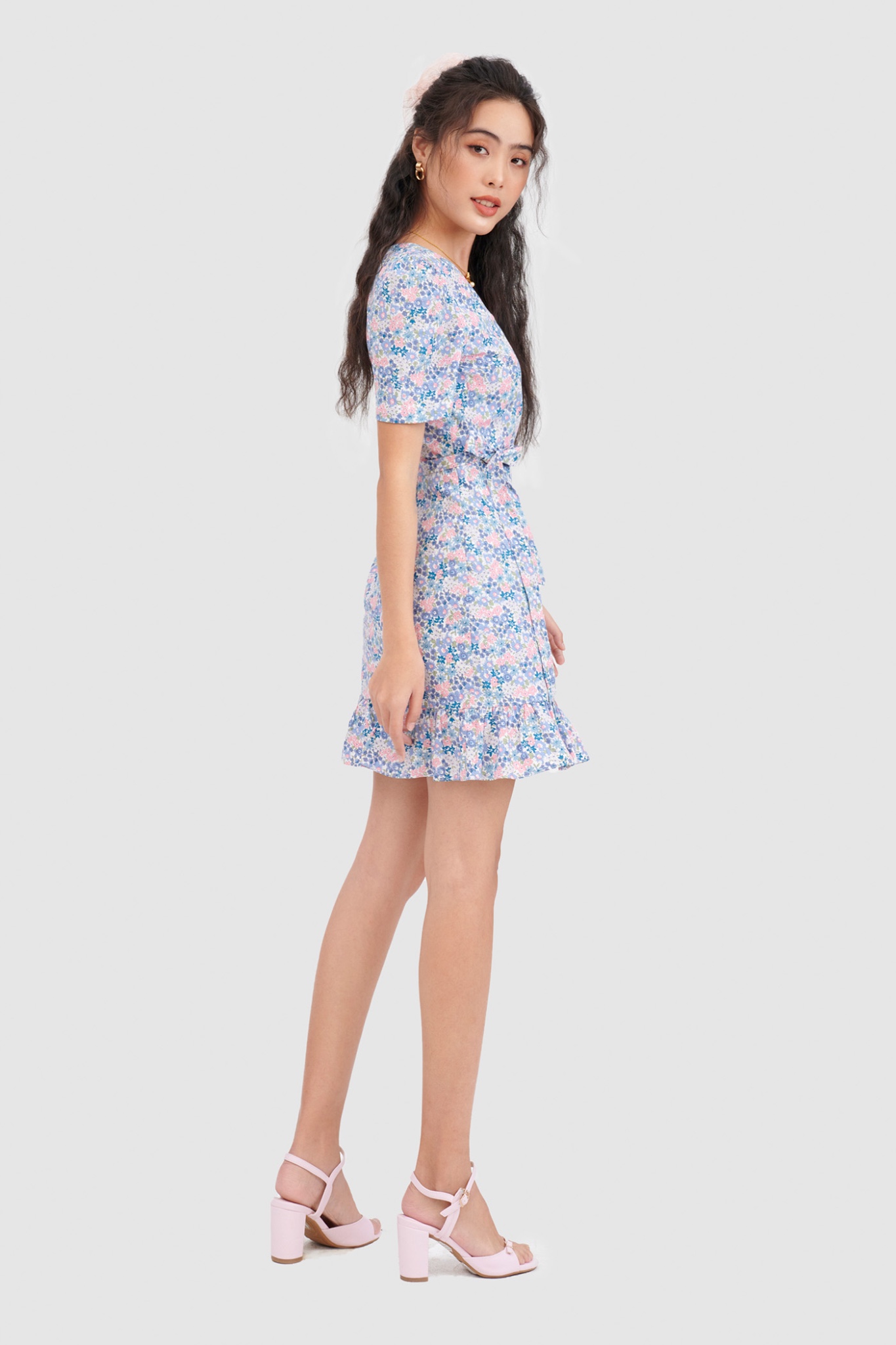 Đầm đắp chéo mini cột nơ hoạ tiết hoa