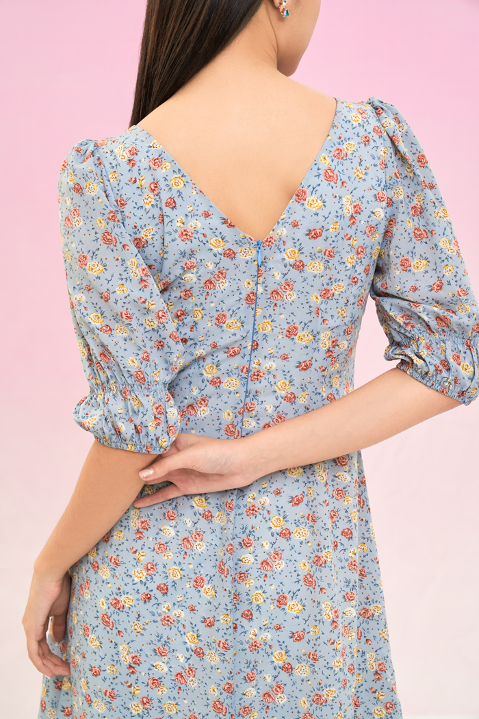 Đầm midi xoắn ngực nhấn tay