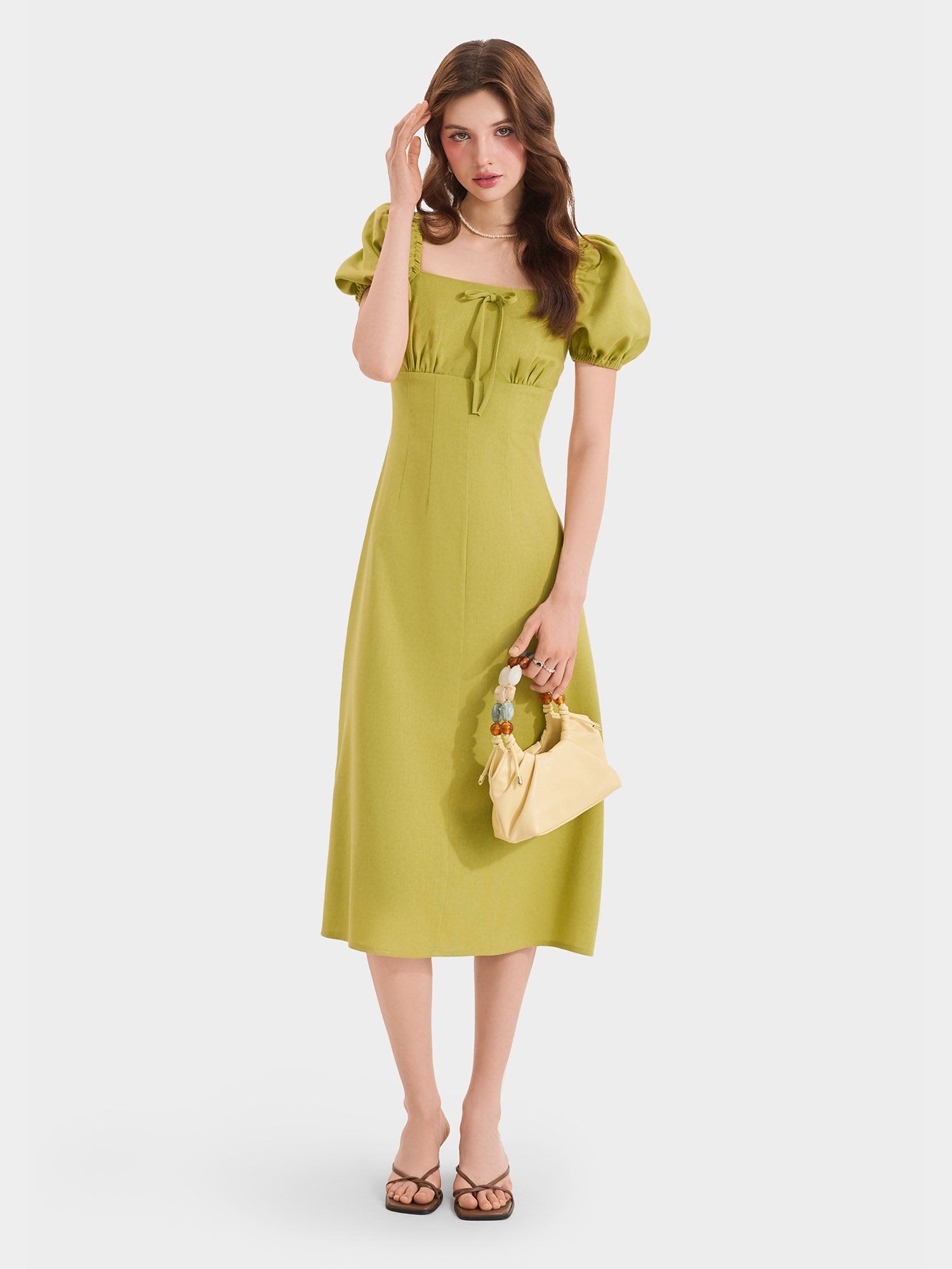  Đầm midi linen cổ vuông tay phồng smocking lưng 