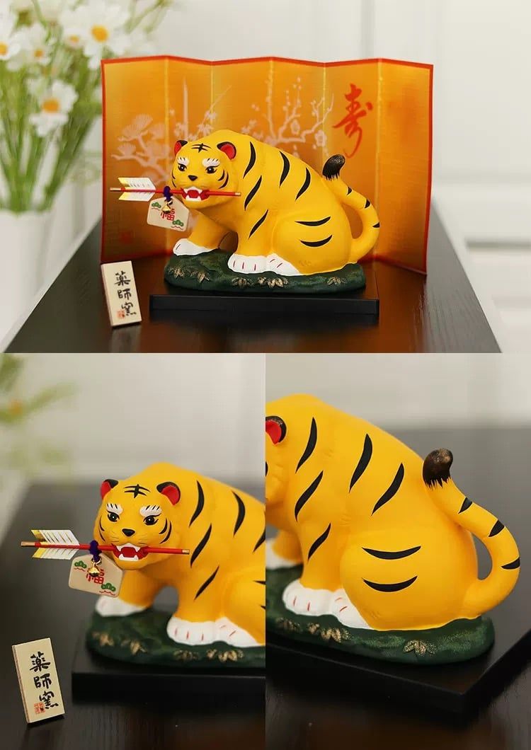  Hổ ngậm mũi tên may mắn 