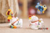  Mèo cầm kẹp 