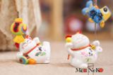  Mèo cầm kẹp 