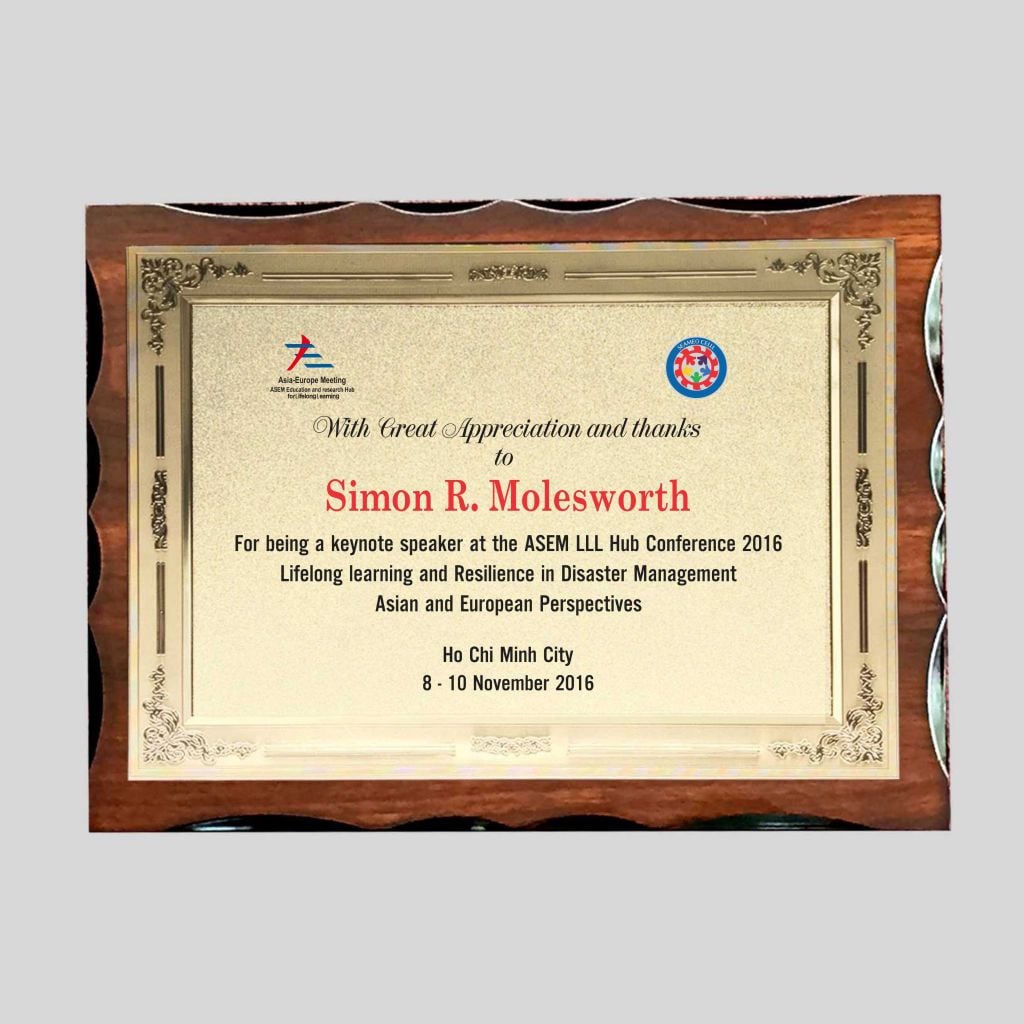 Kỷ niêm chương mặt kẽm đế gỗ