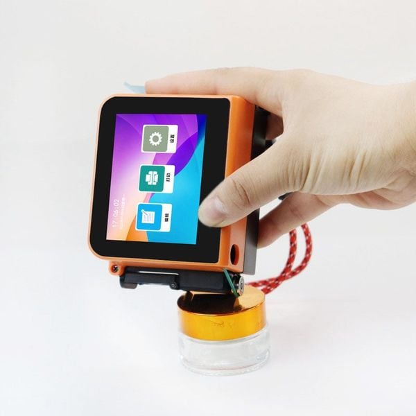 Máy in mini cầm tay Aturos T1 in mã vạch, date trên bao bì lồi lõm