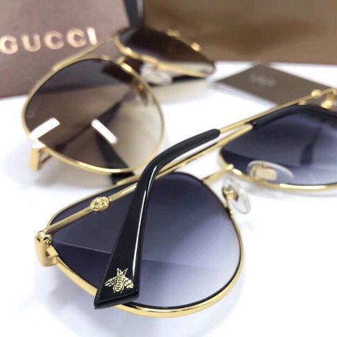 Kính gucci nam nữ gọng ong vàng 2017