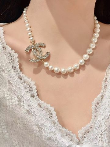 Vòng cổ nữ CHNEL*  ngọc trai pha lê Swarovski đính mặt logo tinh xảo