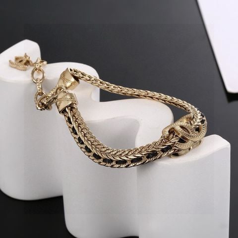 Vòng tay nữ CHNEL*  cao cấp phối da vàng đồng