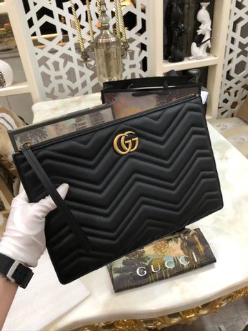 Clutch GUCCI* nam nữ da bò dập hoạ tiết logo vàng đồng đẹp CAO CẤP