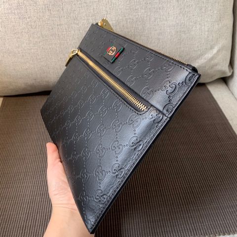 Clutch GUCCI* 29cm da bò dập nổi hoạ tiết logo khoá vàng đẹp cao cấp