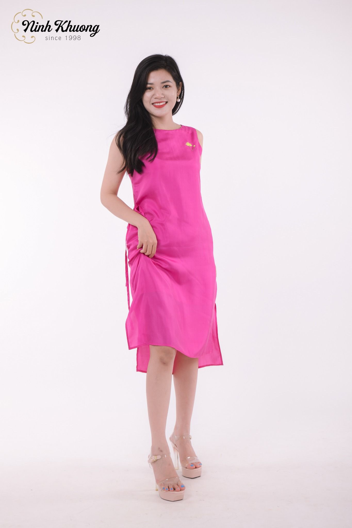  Đầm lụa tà thấp tà cao hồng size M 