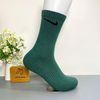 Vớ dài hoạ tiết NIKE xanh lá