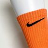 Vớ dài hoạ tiết NIKE cam