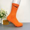Vớ dài hoạ tiết NIKE cam