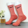 Vớ dài hoạ tiết NIKE cam đất