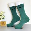 Vớ dài hoạ tiết NIKE xanh lá