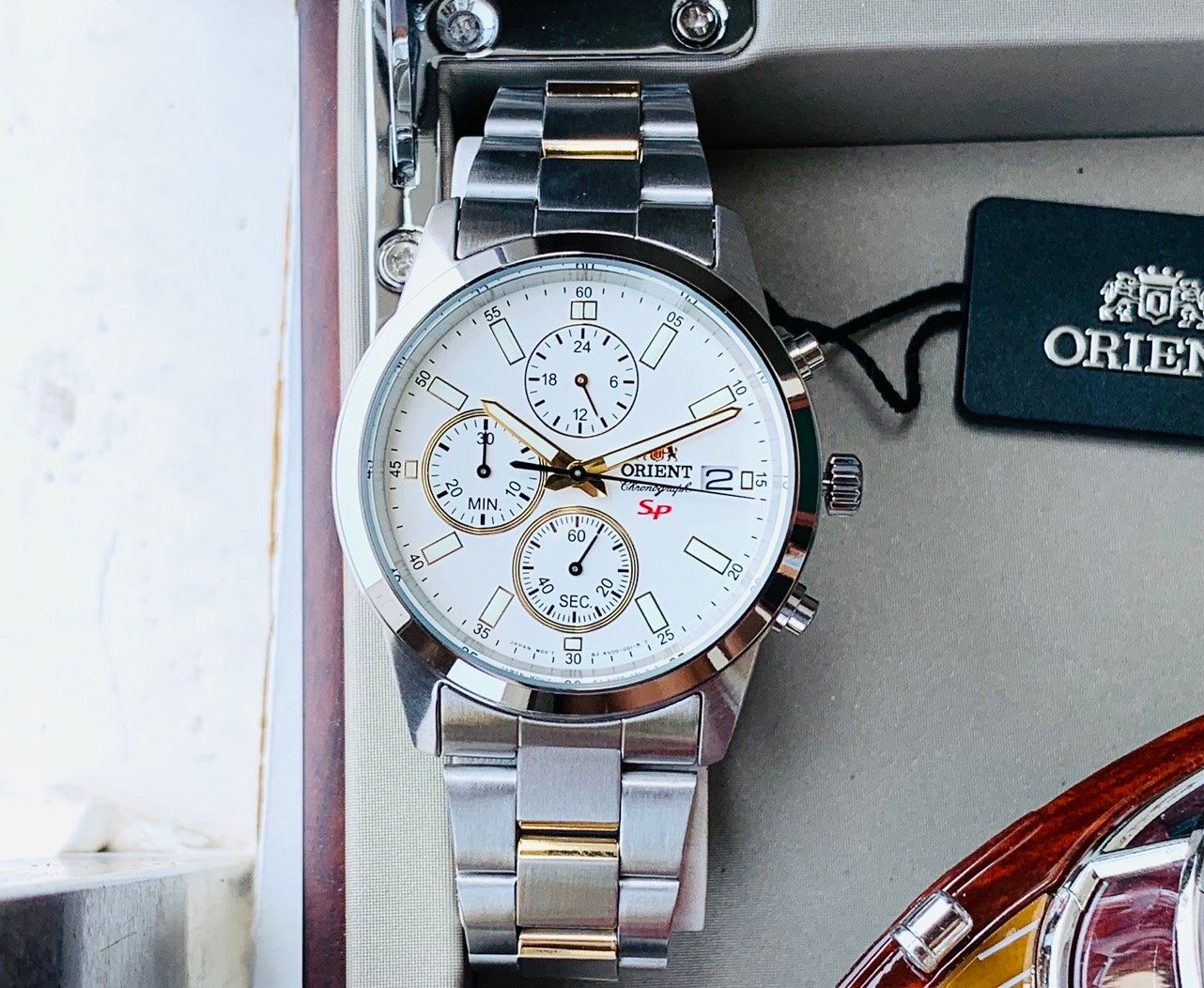 Orient Chronographe Homme FKU00001W0 - 42mm, Mouvement Quartz, Cadran Blanc, Acier Bicolor