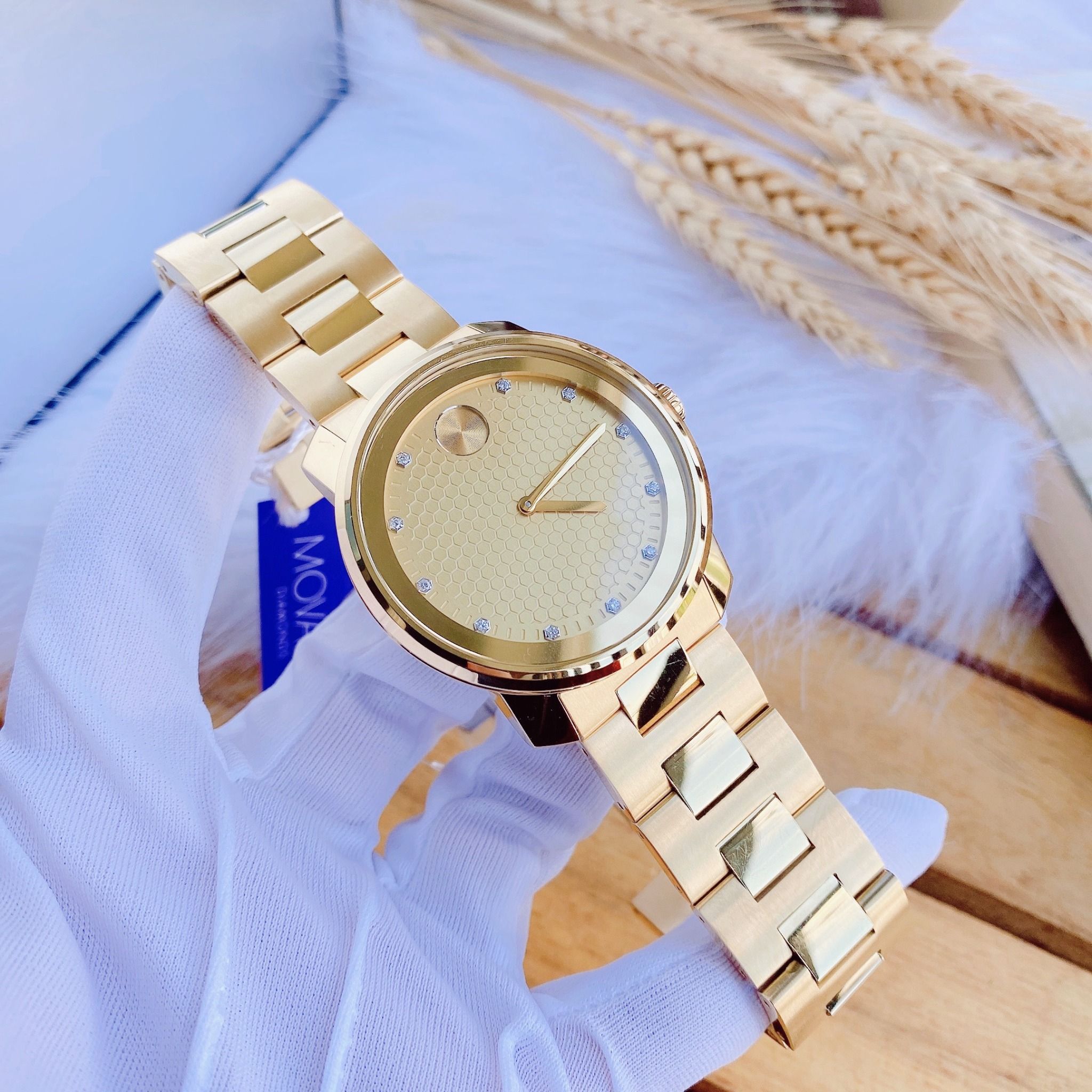 Movado bold gold with cheap diamonds