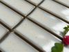 Mosaic thanh lõm trắng sữa hạt mè