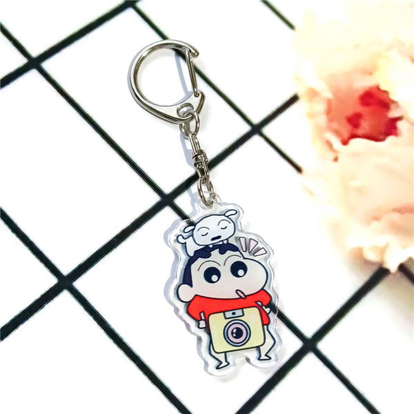 Móc khóa acrylic Crayon Shin Chan Cậu Bé Bút Chì cầm máy ảnh