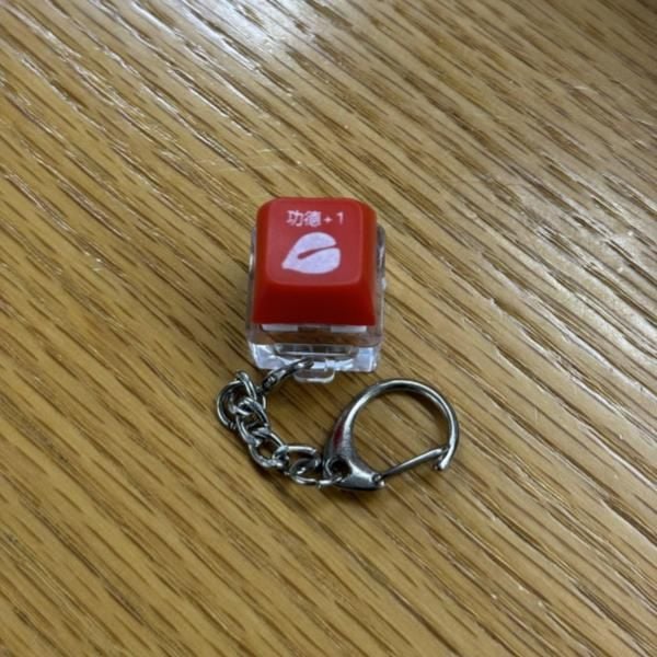  Móc khóa nút bấm công đức đèn LED 