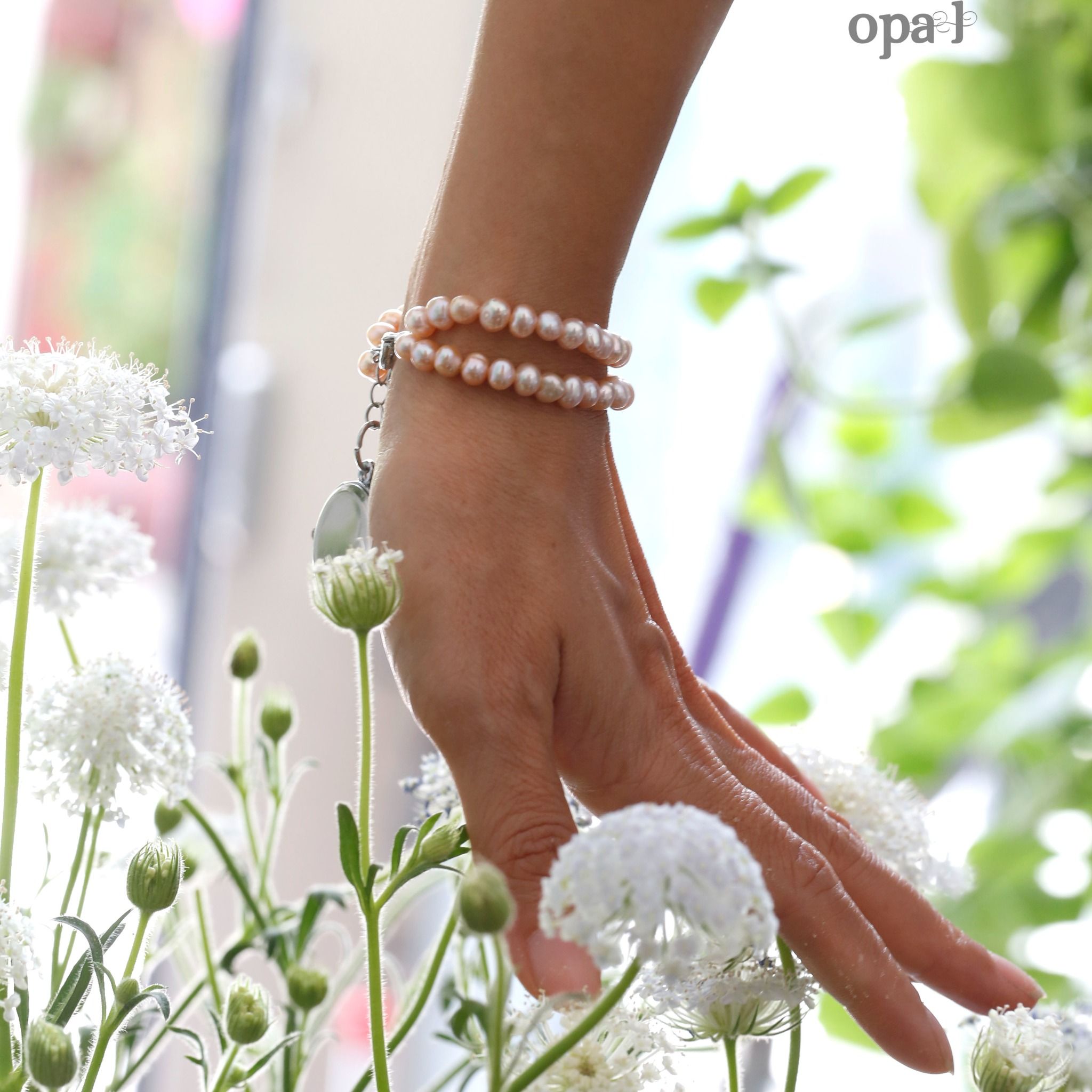  Vòng tay ngọc trai nhí mặt đồng hồ 