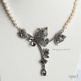  Chuỗi vòng cổ ngọc trai mặt titan đính đá 