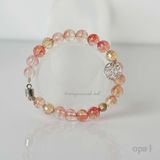  Vòng tay đá tự nhiên thạch anh tóc đỏ charm bạc 