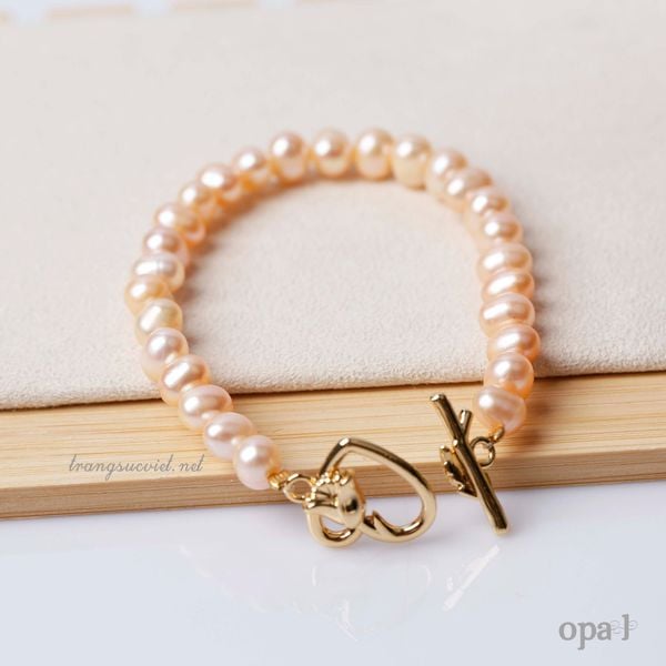  Vòng tay ngọc trai ánh hồng cam 8ly 