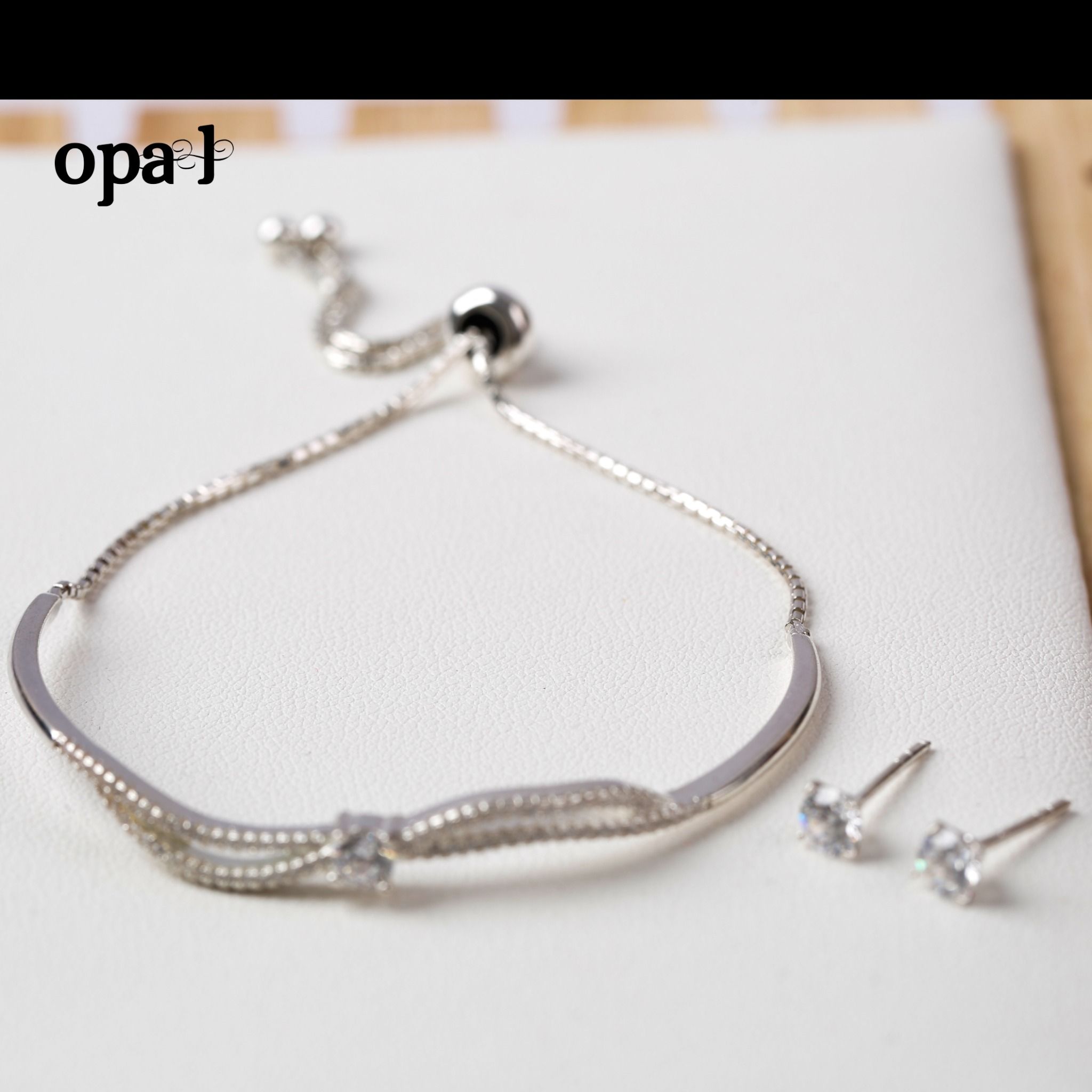  Bộ lắc tay và hoa tai bạc thiết kế phong cách hiện đại , trẻ trung thương hiệu Opal 