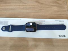  Apple Watch S6 GPS + Cellular, 44mm Gold Stainless Steel Case with Deep Navy Sport Band - (MJXN3VN/A) 