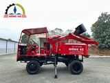 Máy trộn bê tông tự cấp liệu 9 bao 2 cầu động cơ 4 máy