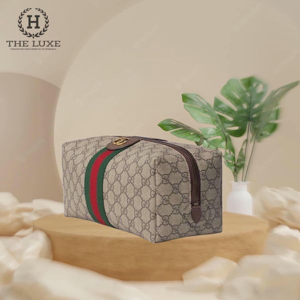 Wash bag Gucci vân mono nâu vàng tag cờ