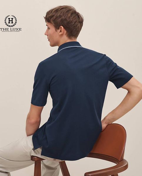 Polo Hermes xanh navy viền cổ ghi