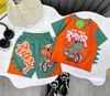Bộ thun khủng long cho bé trai màu cam