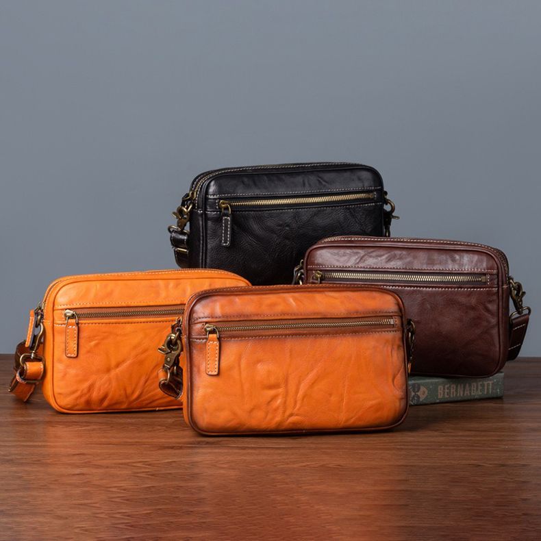 Clutch cầm tay nam kiêm đeo chéo da bò - 4309500