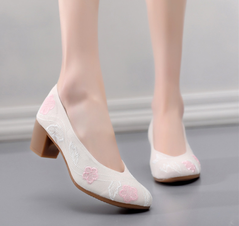 Nhân bản của Giầy Hoa Mai
