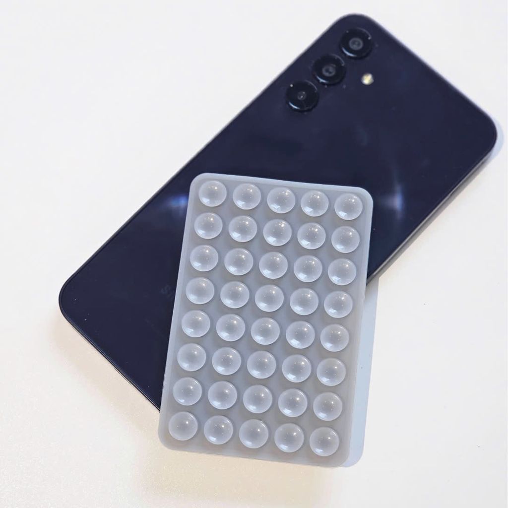 Đệm silicon hít máy ảnh, điện thoại đa năng 2 mặt gắn nhiều mặt phẳng